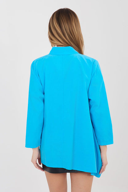 Back view of turquoise long sleeve shirt with button placket and gathered back