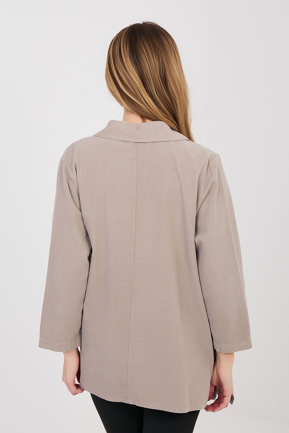Back view of taupe long sleeve shirt with button placket and three-quarter sleeves