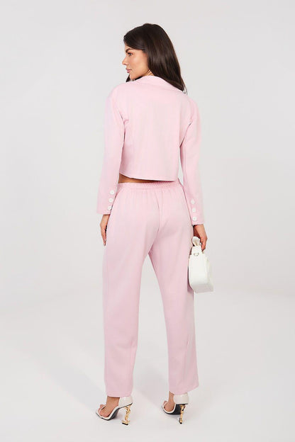 Pink two-piece suit: cropped jacket and matching ankle trousers in pastel tone