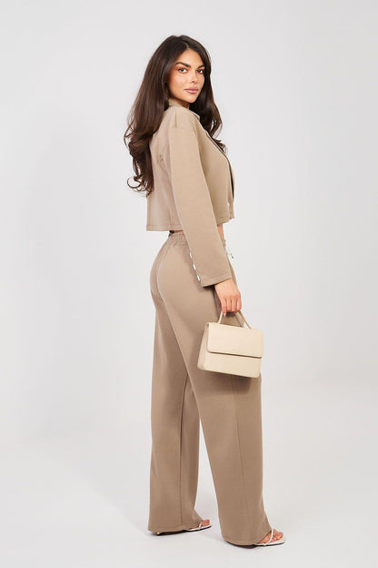 Taupe two-piece set with cropped blazer and wide-leg trousers, side view