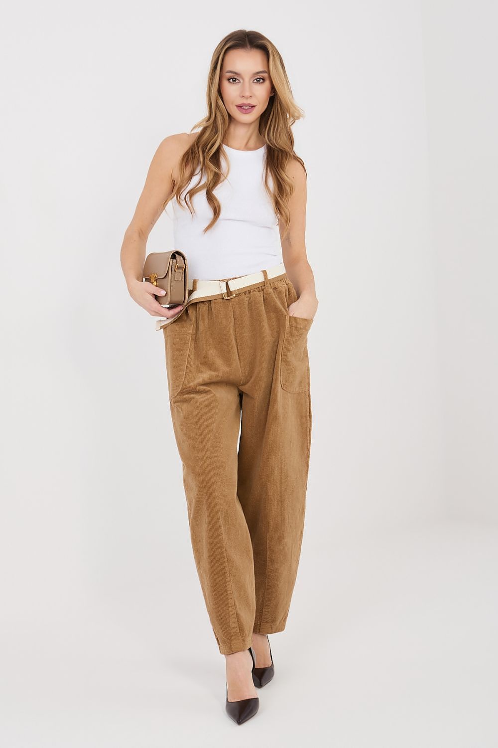 Brown corduroy trousers with high waist, belt loops, and large front pockets