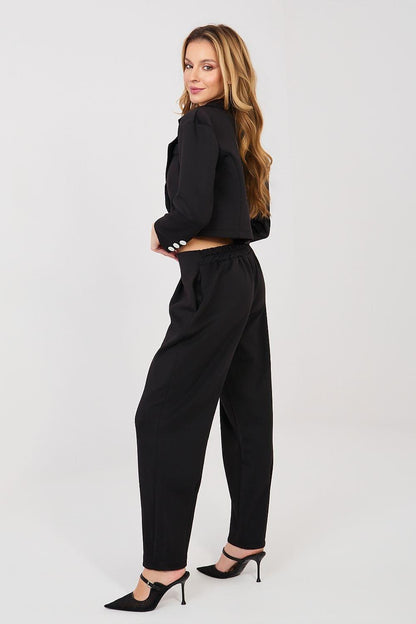 Black two-piece pantsuit set with cropped jacket and high-waist tapered trousers
