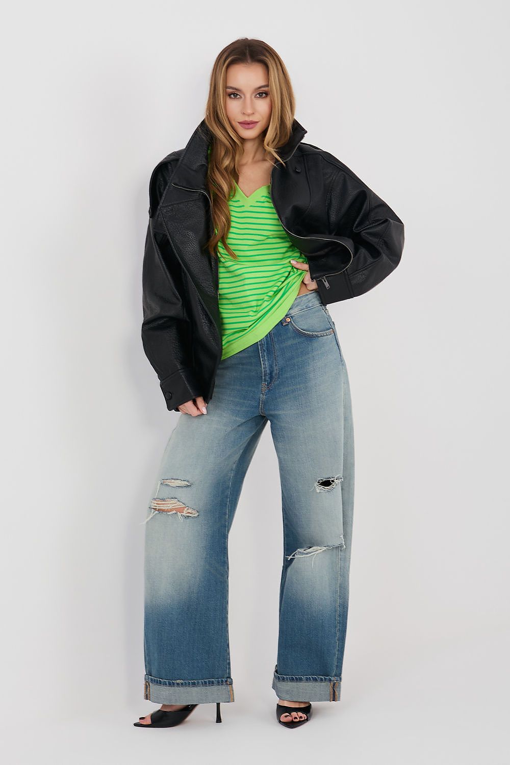 Green striped V-neck T-shirt under black jacket, short sleeves