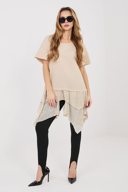Beige blouse with short sleeves and layered ruffled hem.