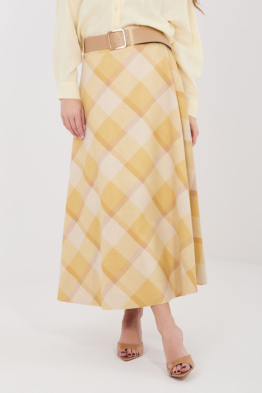 Yellow and cream check midi skirt with tan belt at the waist