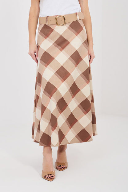 Brown and cream check long skirt with tan belt and gold buckle at waist