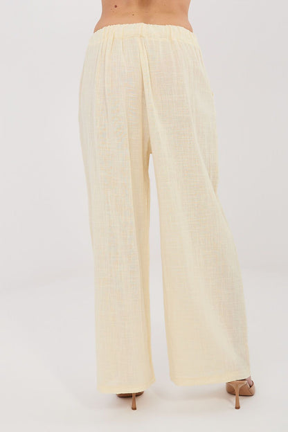 Women’s beige wide-leg trousers with elastic waist for a flowing fit