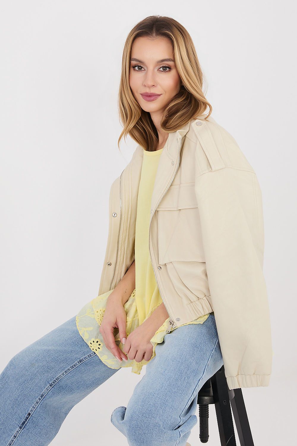 Yellow short-sleeve blouse with tiered lace ruffle hem and eyelet details