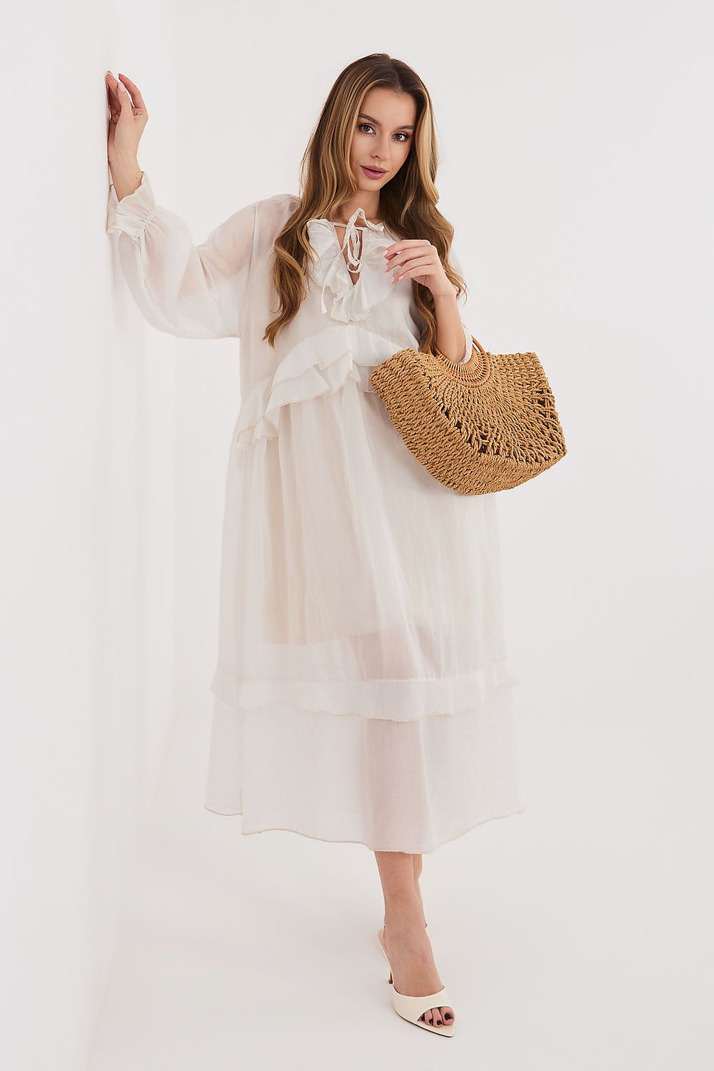 Cream long-sleeve daydress with gathered bodice and tiered skirt