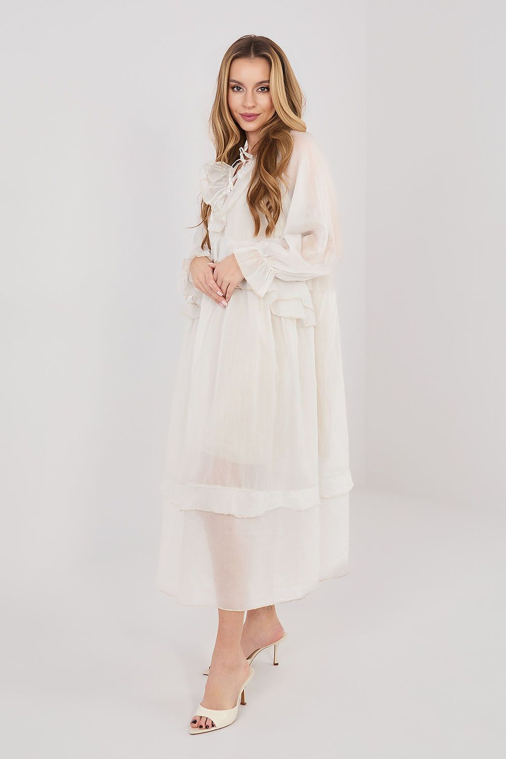 Cream long-sleeve daydress with belt tie and tiered hem