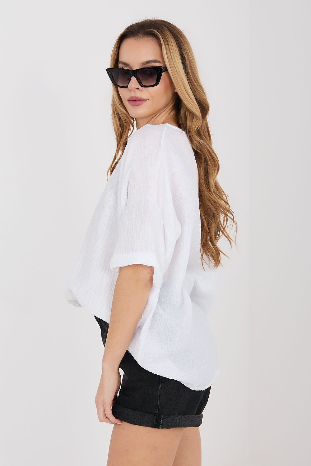 White short sleeve button-front shirt, side view