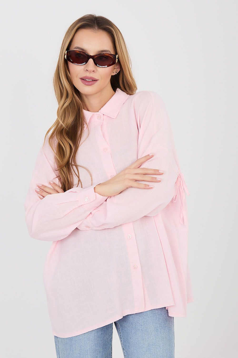 Pink long-sleeve button-front shirt with pointed collar and long sleeves