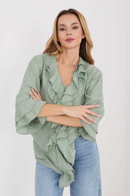 Green long sleeve shirt with V-neck ruffle front and tiered sleeves