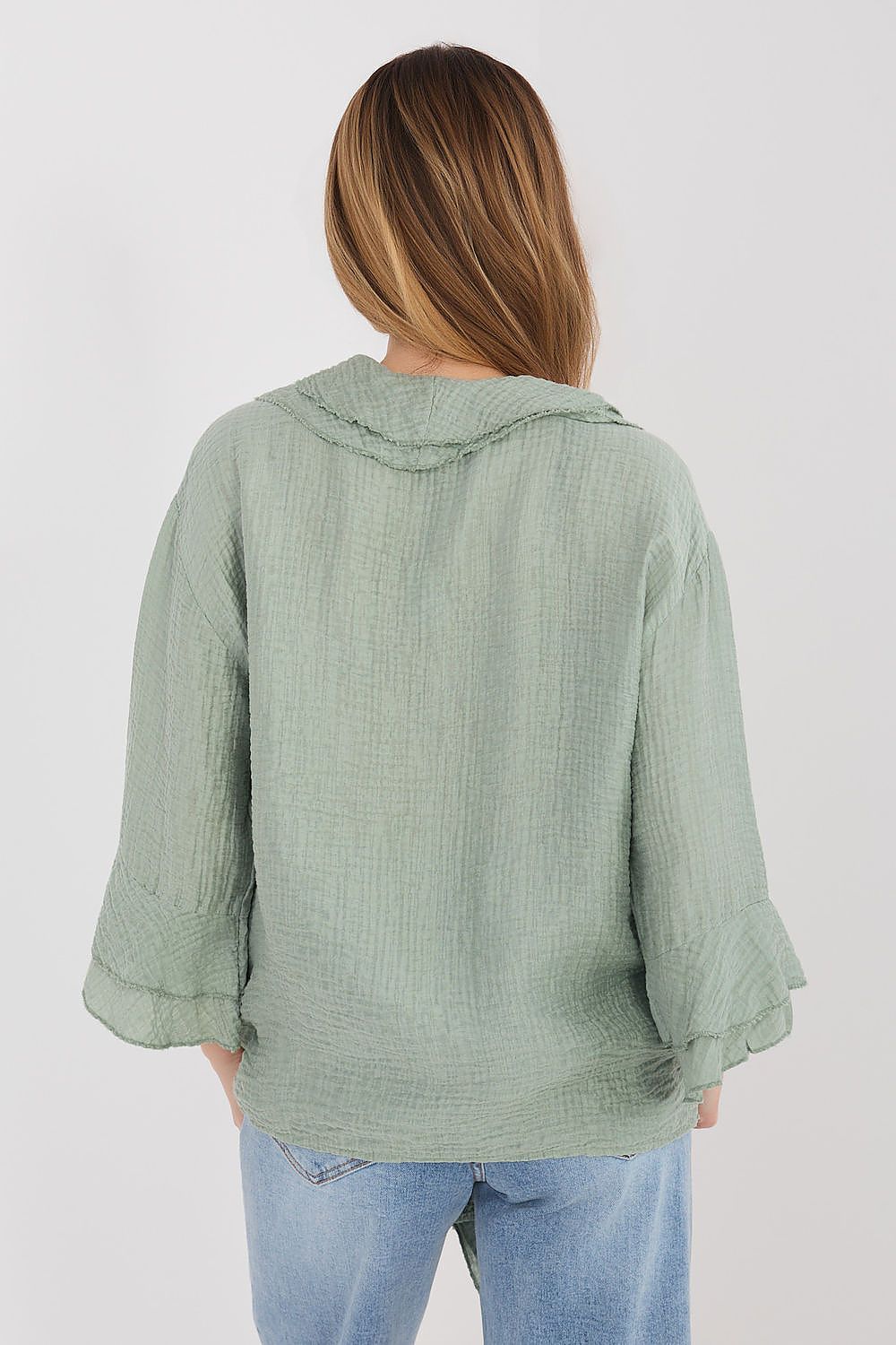 Green long sleeve shirt with back yoke seam and ruffled cuffs