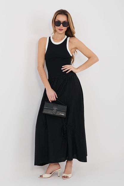 Black long skirt with elastic waistband and gathered tiers, lace hem