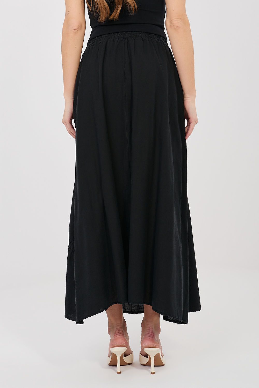 Black long skirt with gathered yoke and soft pleats, midi length
