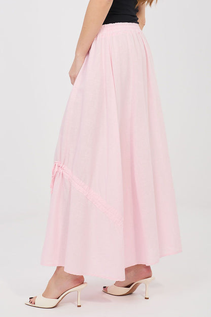 Pink long skirt with elastic waistband and lace-trimmed hem, flowy gathered tiers