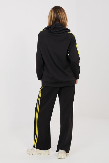 Back view of black tracksuit set: hooded jacket and straight-leg pants with neon yellow trim.