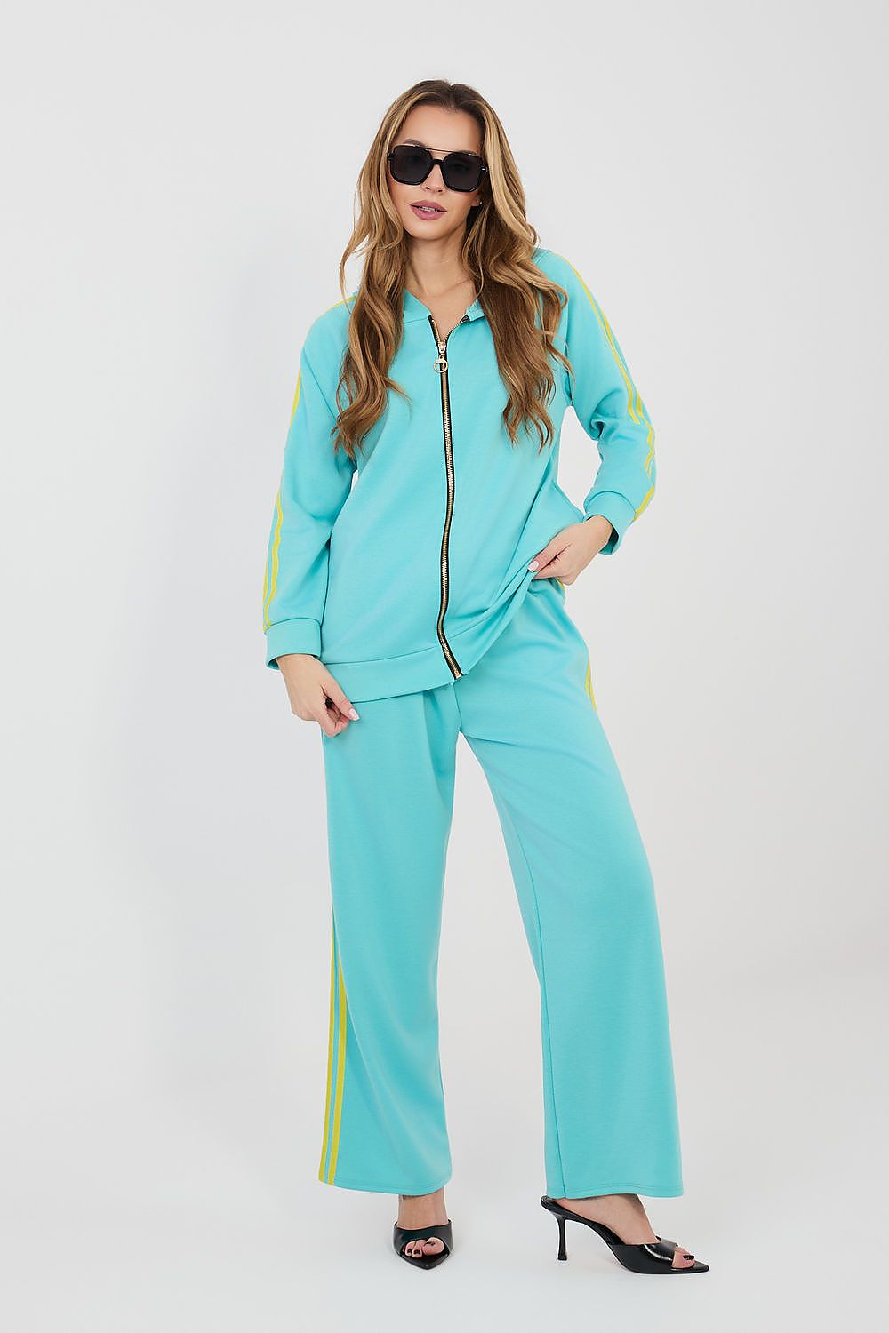 Turquoise zip-up hoodie and wide-leg pants set with neon-yellow side stripes
