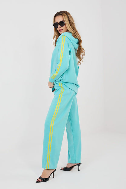 Turquoise tracksuit set, side view: zip hoodie and wide-leg pants with yellow stripes