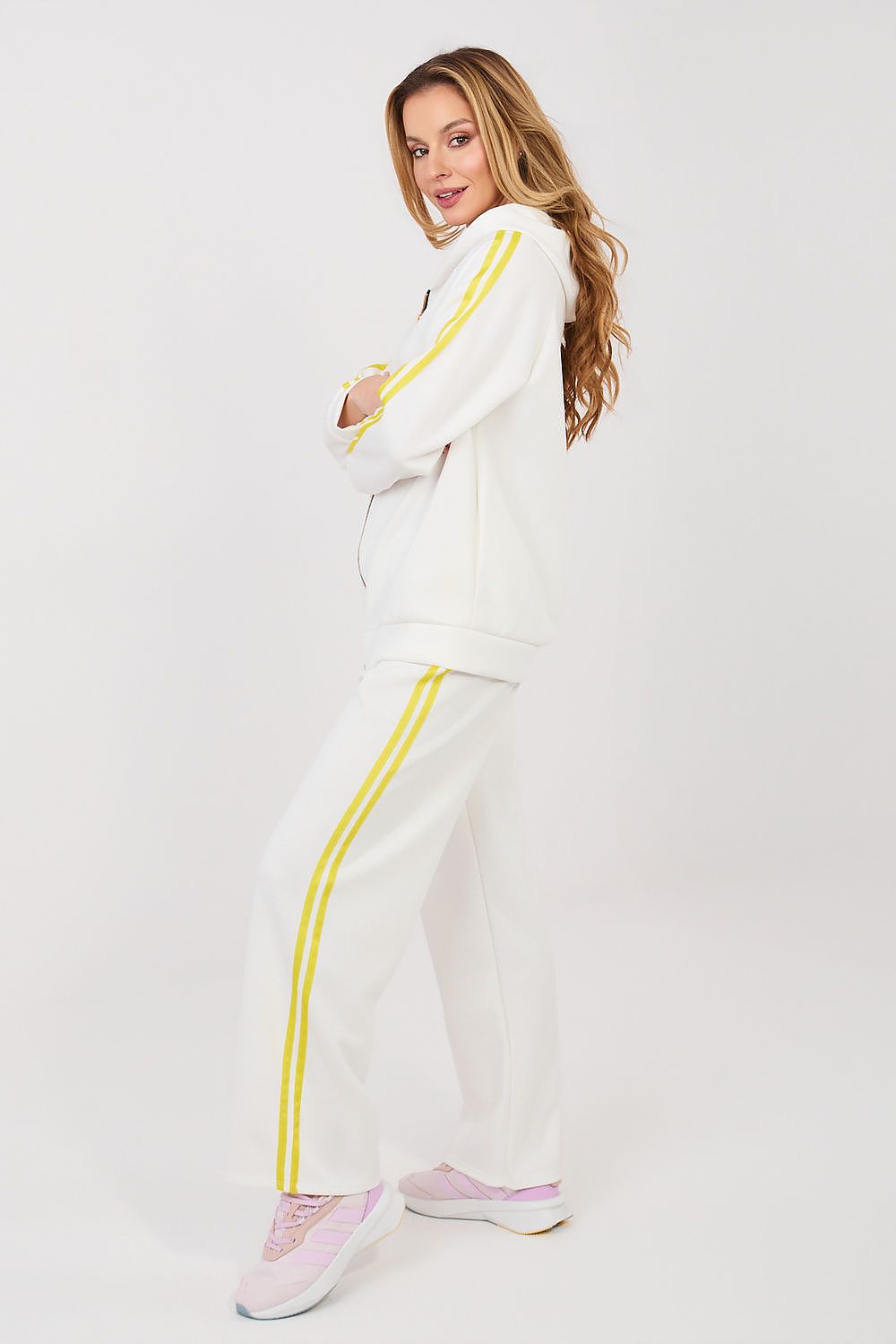 White zip hoodie and wide-leg pants set with yellow side stripe detail