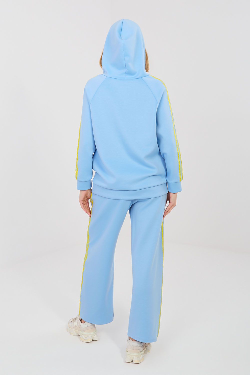 Blue hoodie and wide-leg pants set with yellow side stripes and drawstring waist