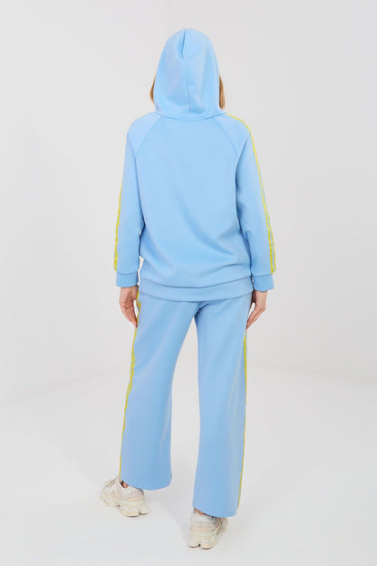 Blue hoodie and wide-leg pants set with yellow side stripes and drawstring waist