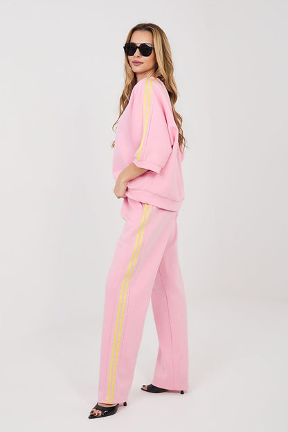 Pink matching set with gold piping: short-sleeve top and wide-leg pants