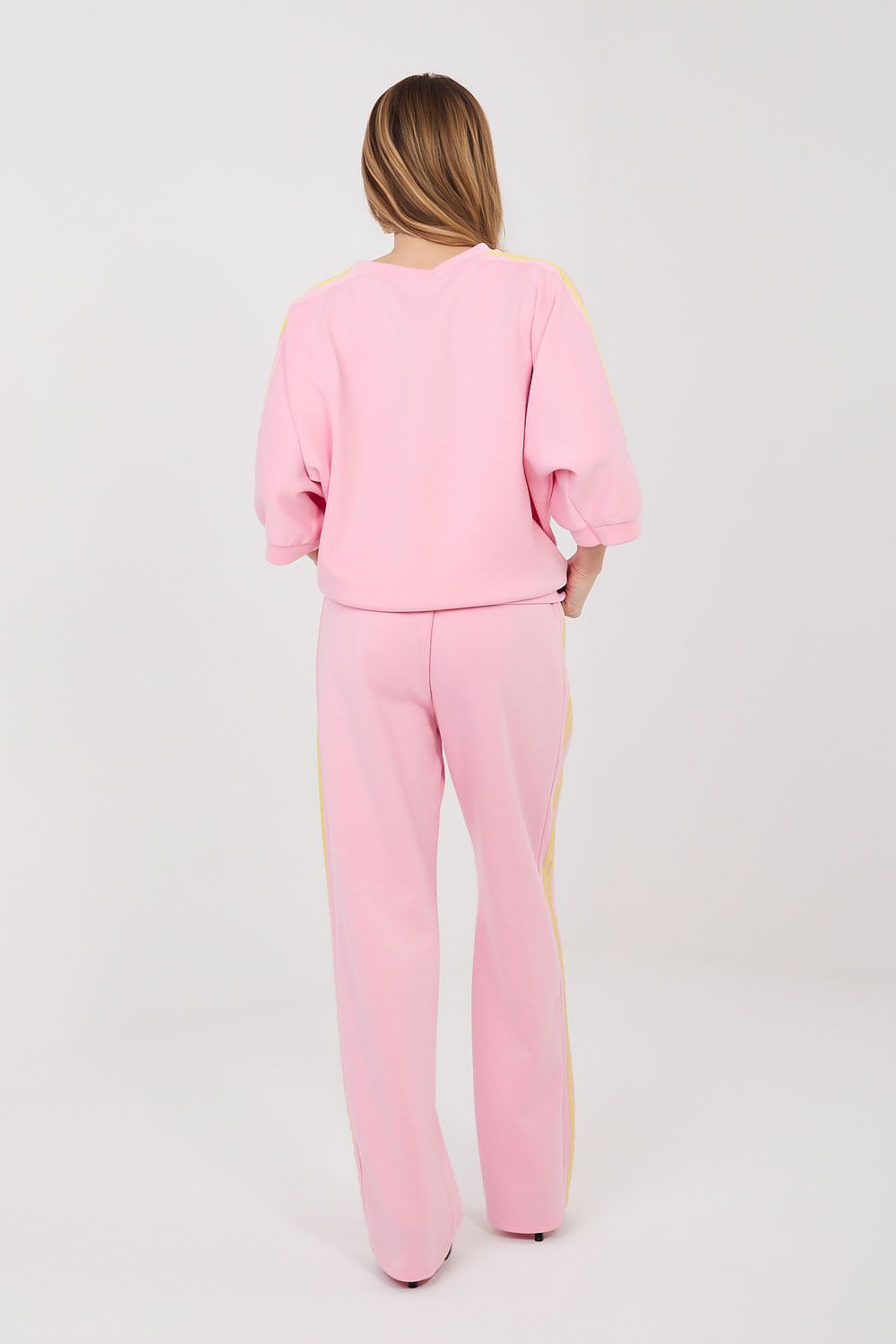 Pink matching set, back view: relaxed top with wide-leg pants