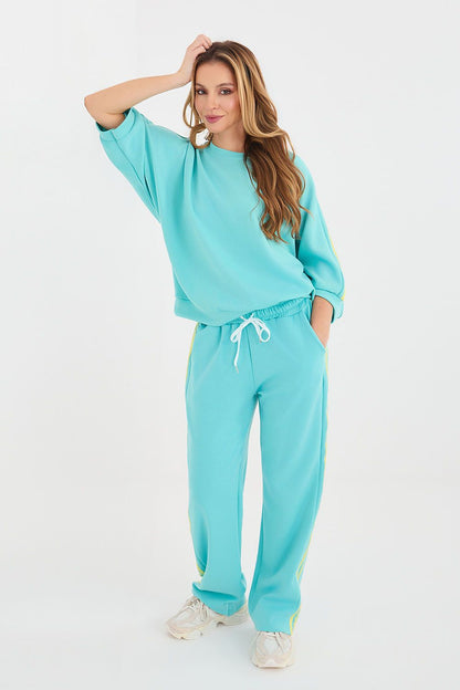 Turquoise matching sweatshirt and jogger pants set with tied drawstring waist