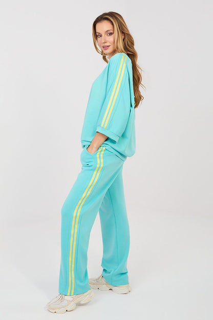 Turquoise jogger pants and sweatshirt set with yellow side stripe detail