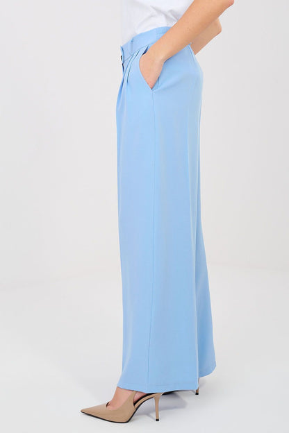 Women's light blue wide-leg trousers with side waistband button detail