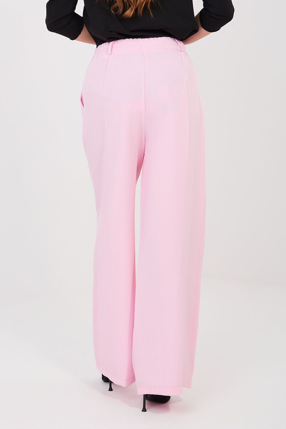 Pink high-waist wide-leg trousers with center back seam and buttoned waistband