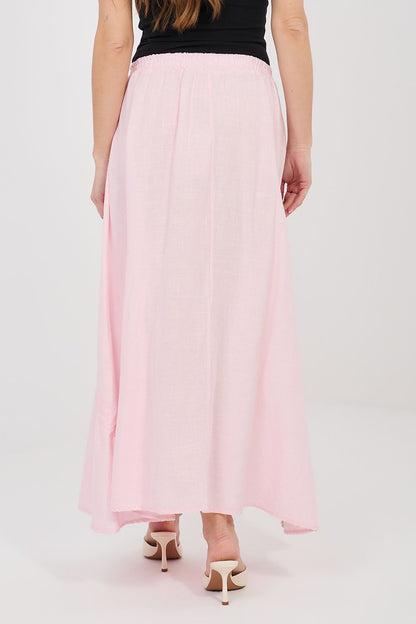 Pink long skirt with elastic waistband and loose gathered drape, rear view