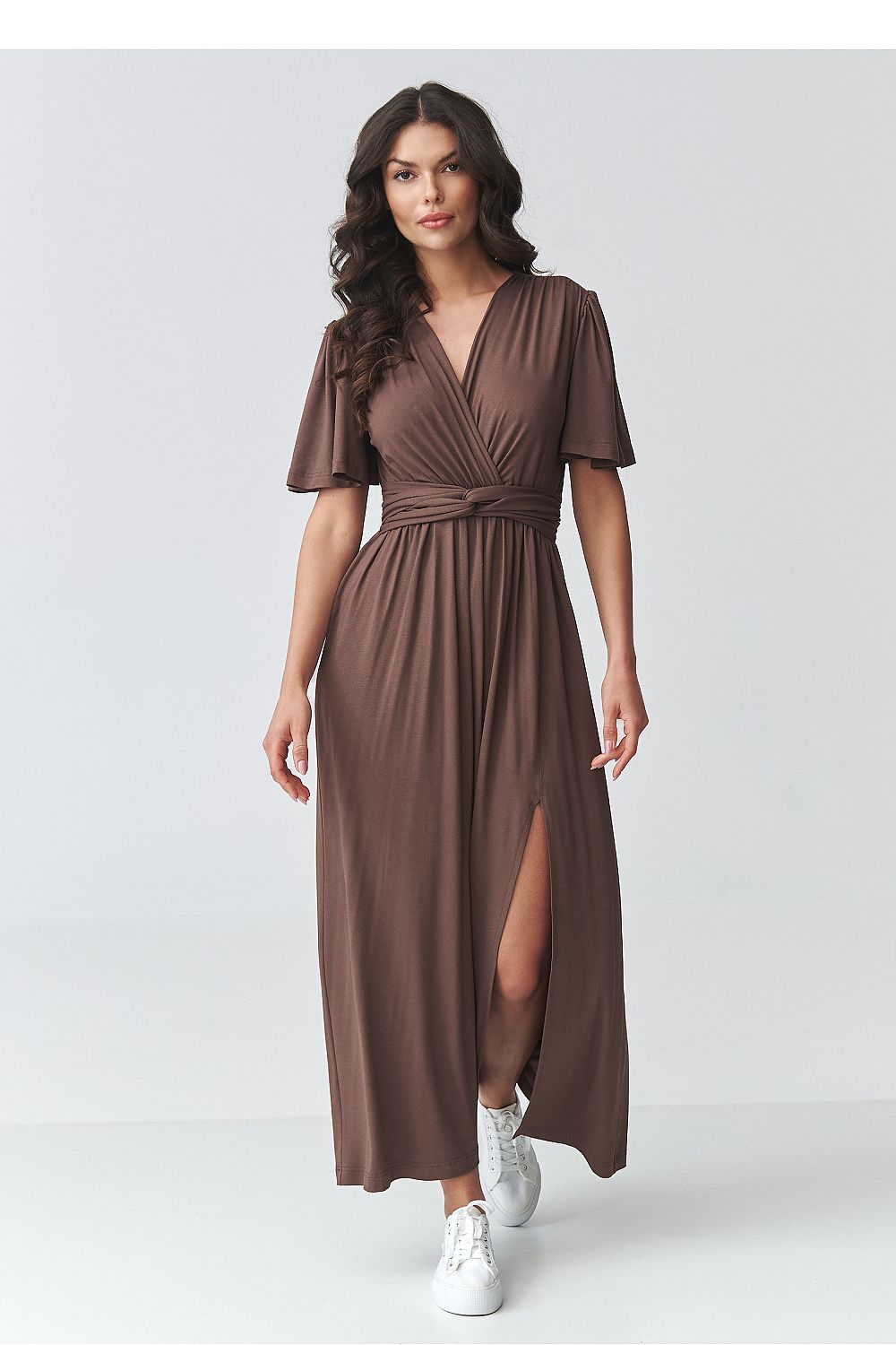 Brown v-neck daydress with short flutter sleeves, waist tie, and side slit at hem