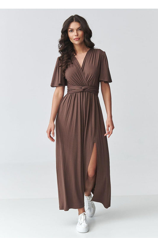 Brown v-neck daydress with ruched waist tie, short sleeves, and long side slit hem.