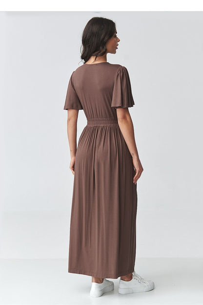 Brown daydress back view with short flutter sleeves and gathered waist, long skirt