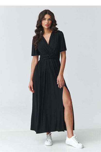 Black daydress with v-neck, short flutter sleeves, belted waist, and side slit at hem