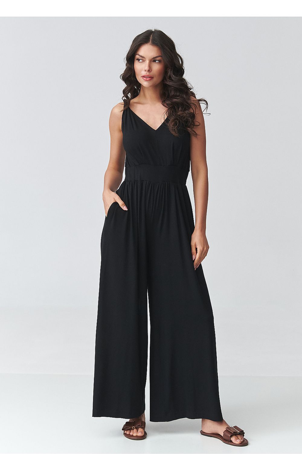 Black sleeveless V-neck wide-leg jumpsuit with gathered waist, ankle length