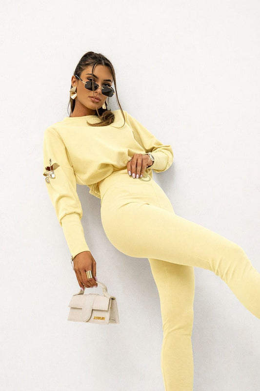 Yellow two-piece set with long-sleeve sweatshirt and matching slim pants