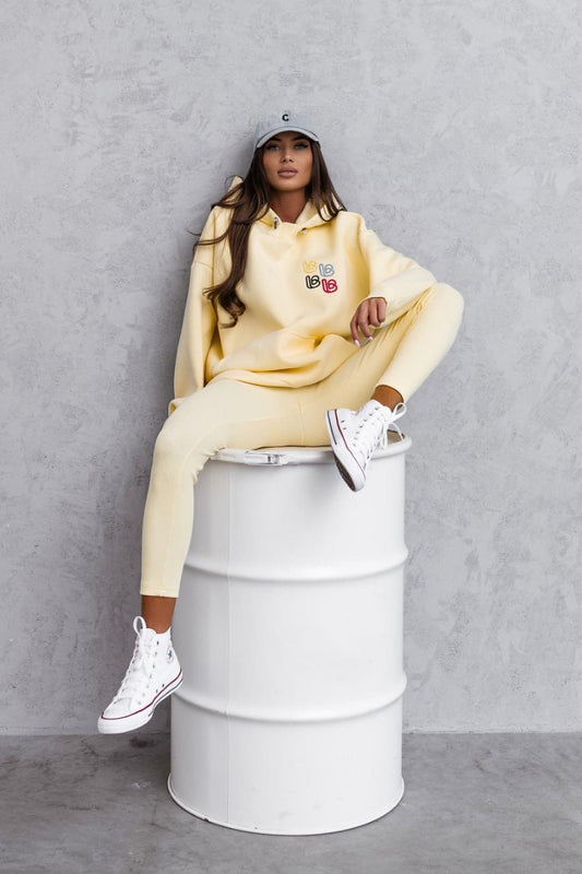 LaBalancia yellow hoodie and jogger set with chest logo and kangaroo pocket
