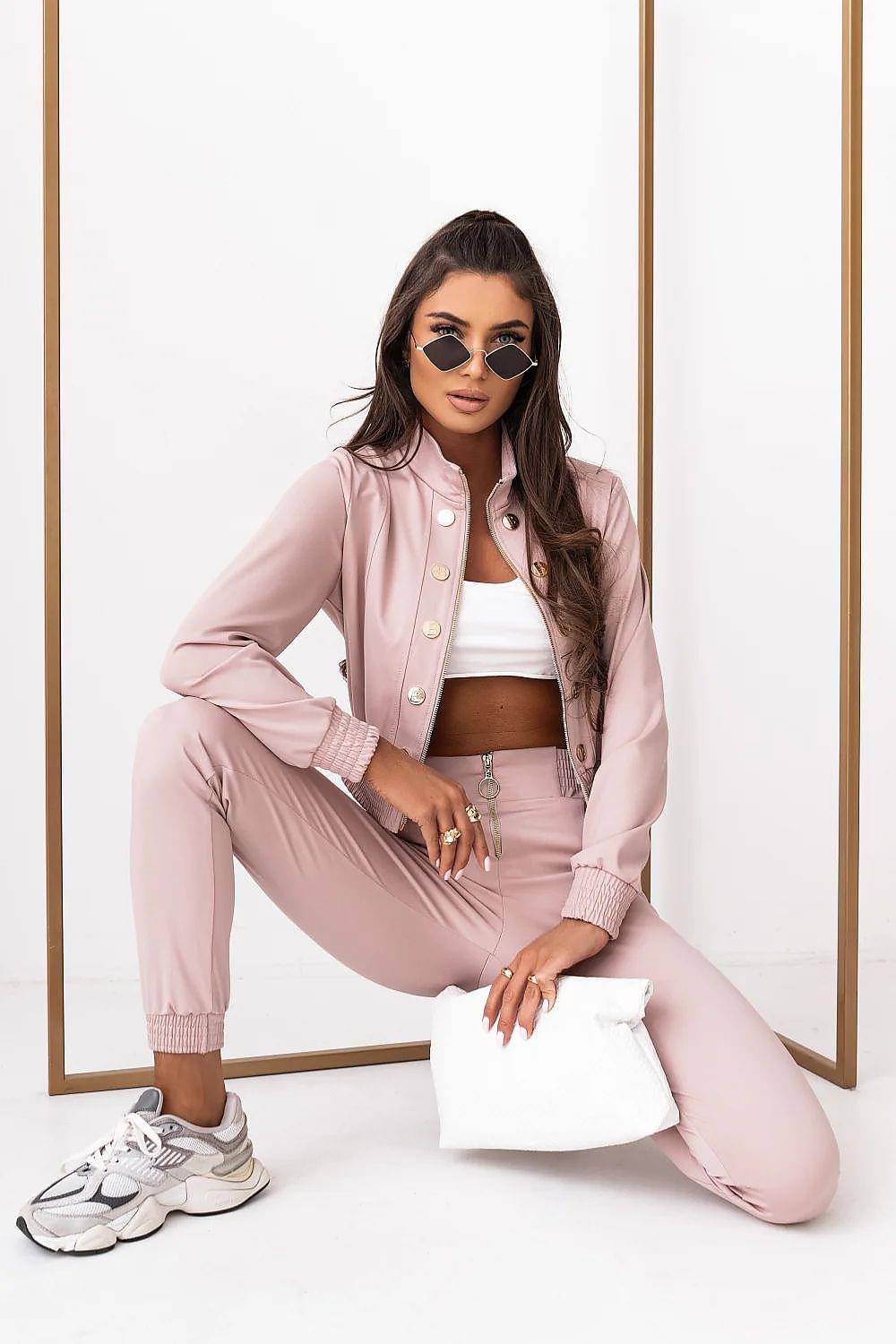 Pink two-piece outfit with button-front jacket and matching jogger pants