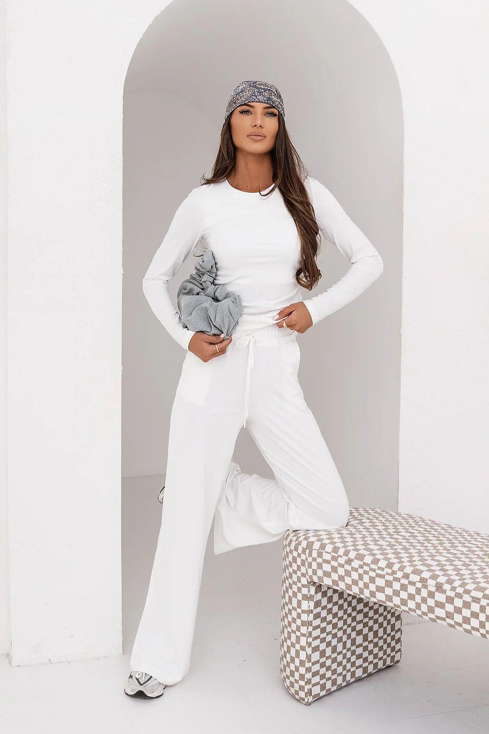 White long-sleeve top and wide-leg pants set with waist tie
