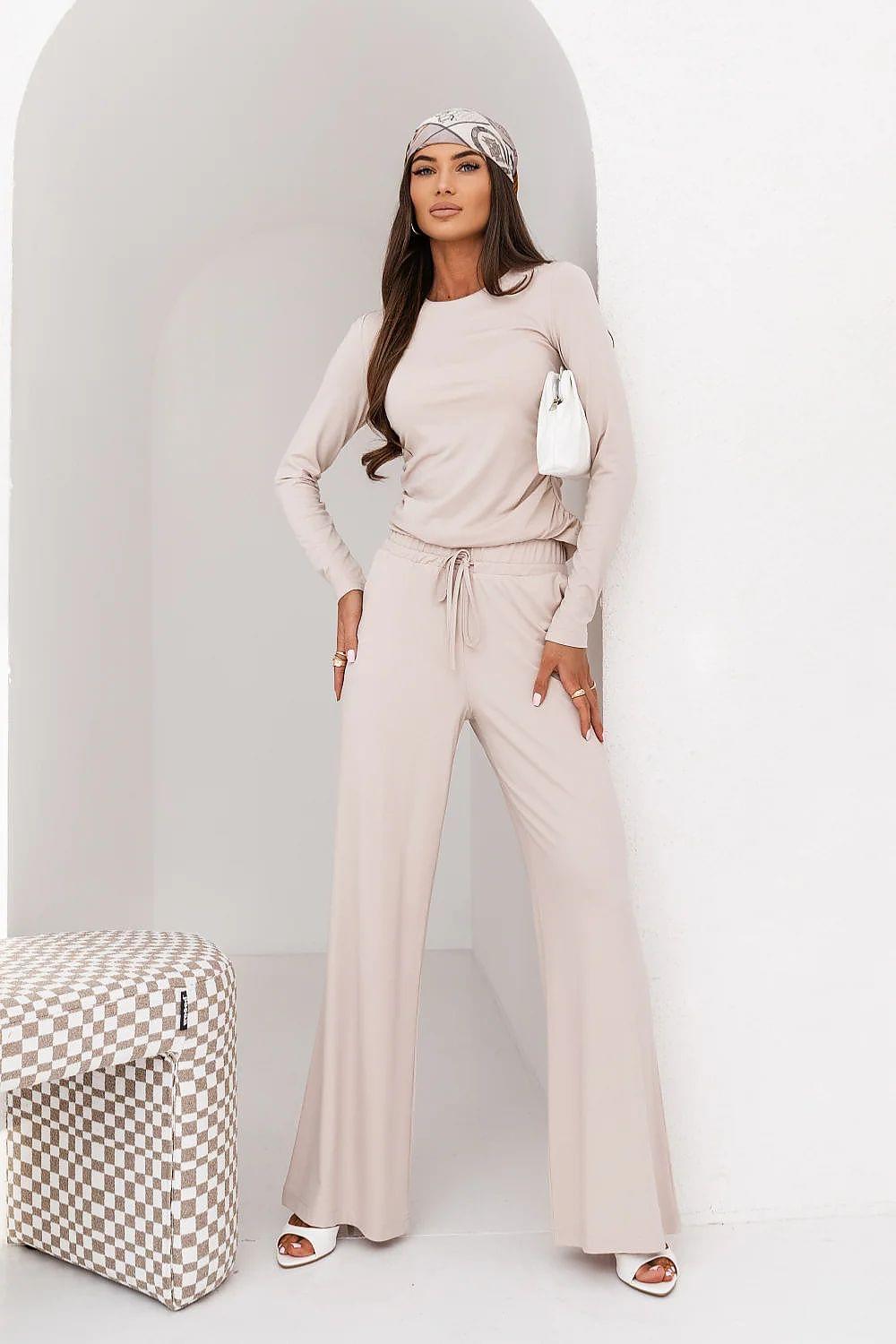 Cream two-piece lounge set with long-sleeve top and drawstring waist wide-leg pants