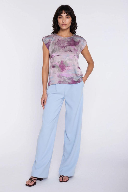 Women’s light blue wide-leg trousers with a high waist and flowing straight legs.
