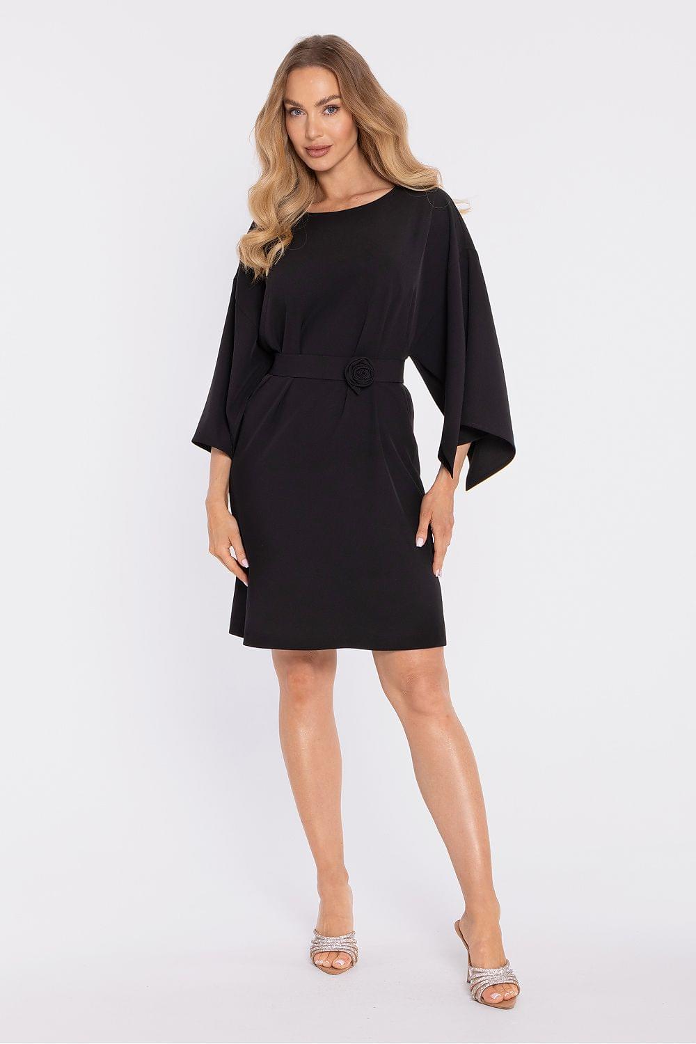 Black cocktail dress with tie waist, side ruching, and loose quarter sleeves