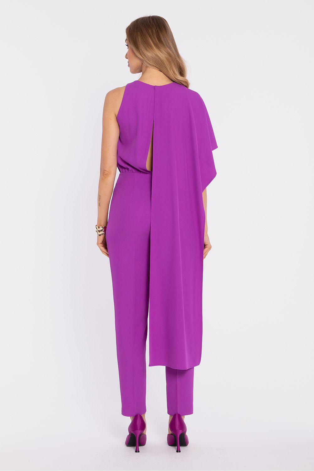 Purple sleeveless jumpsuit back view with draped overlay and tapered ankle-length pants