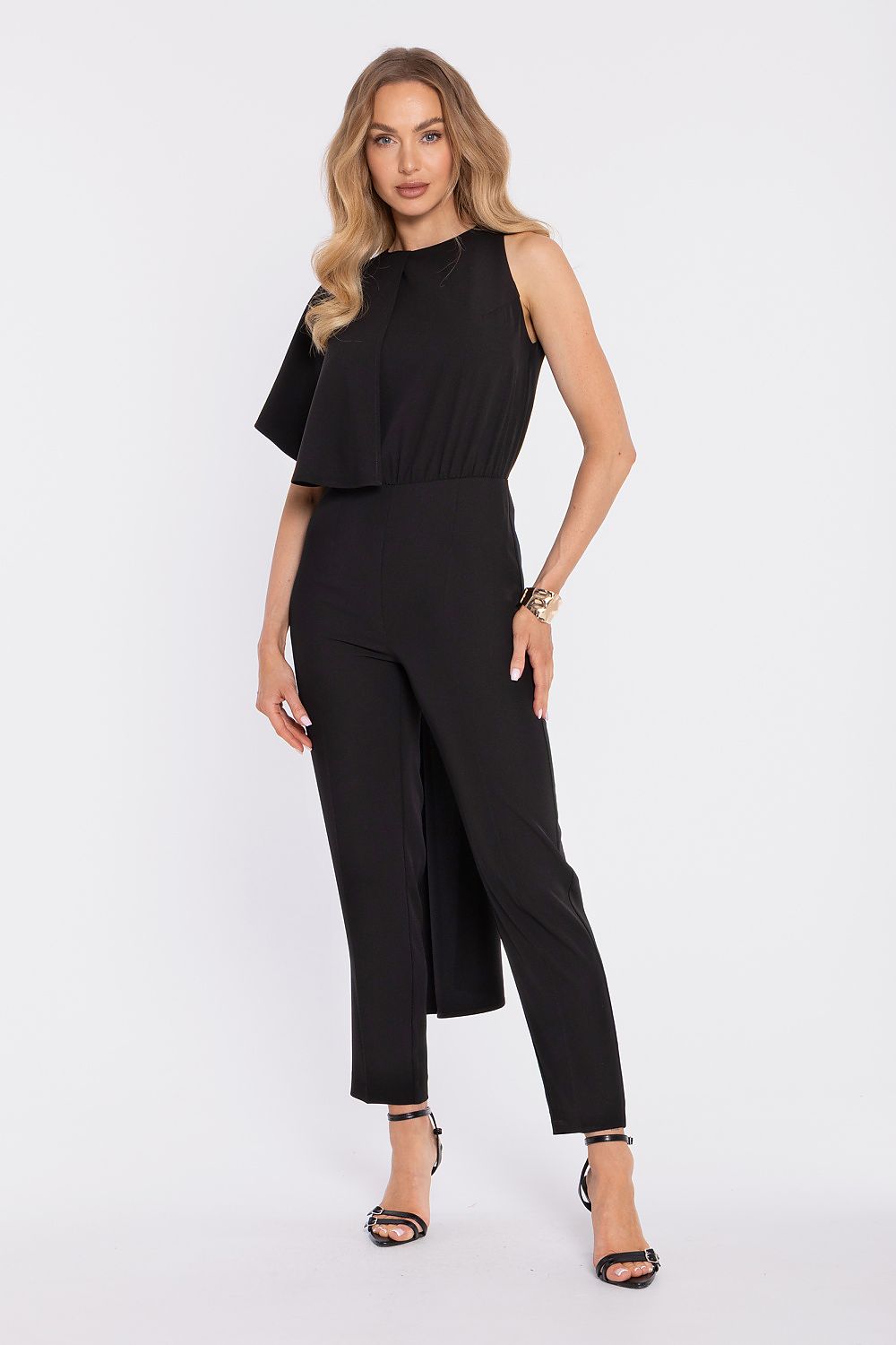 Moe suit: sleeveless black top with draped overlay and tapered black trousers