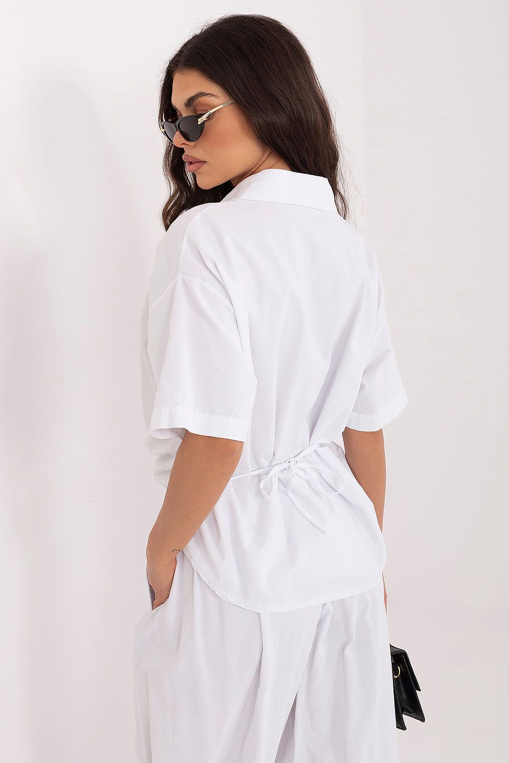 White short-sleeve button-up shirt, back view with gathered waist seam
