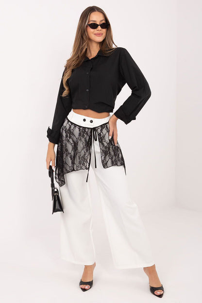 Black long-sleeve button-up shirt with pointed collar and cropped-length hem